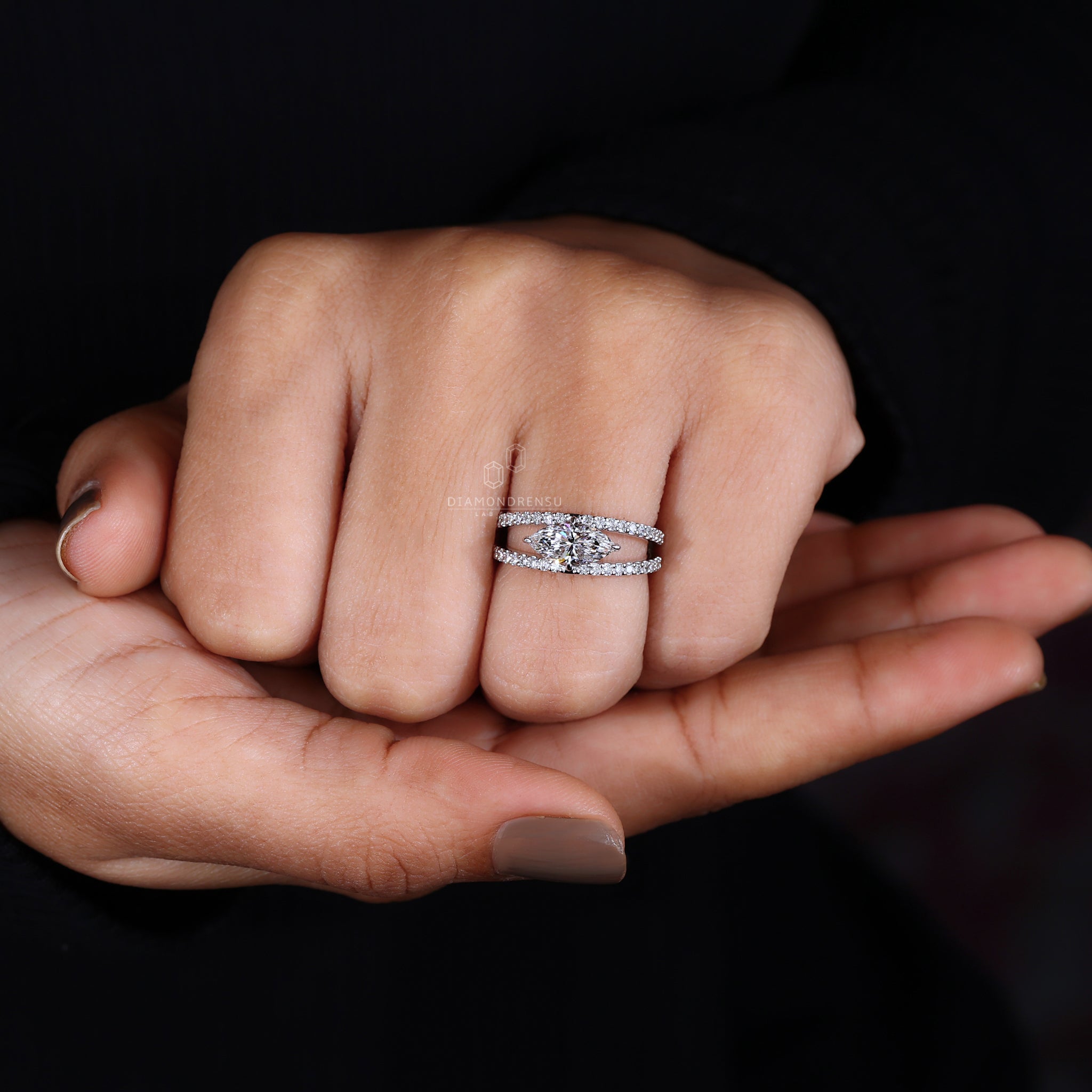 East west engagement ring with split shank.