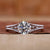 Round solitaire engagement ring has a 4 prong setting.
 Round solitaire engagement ring has a 4 prong setting.