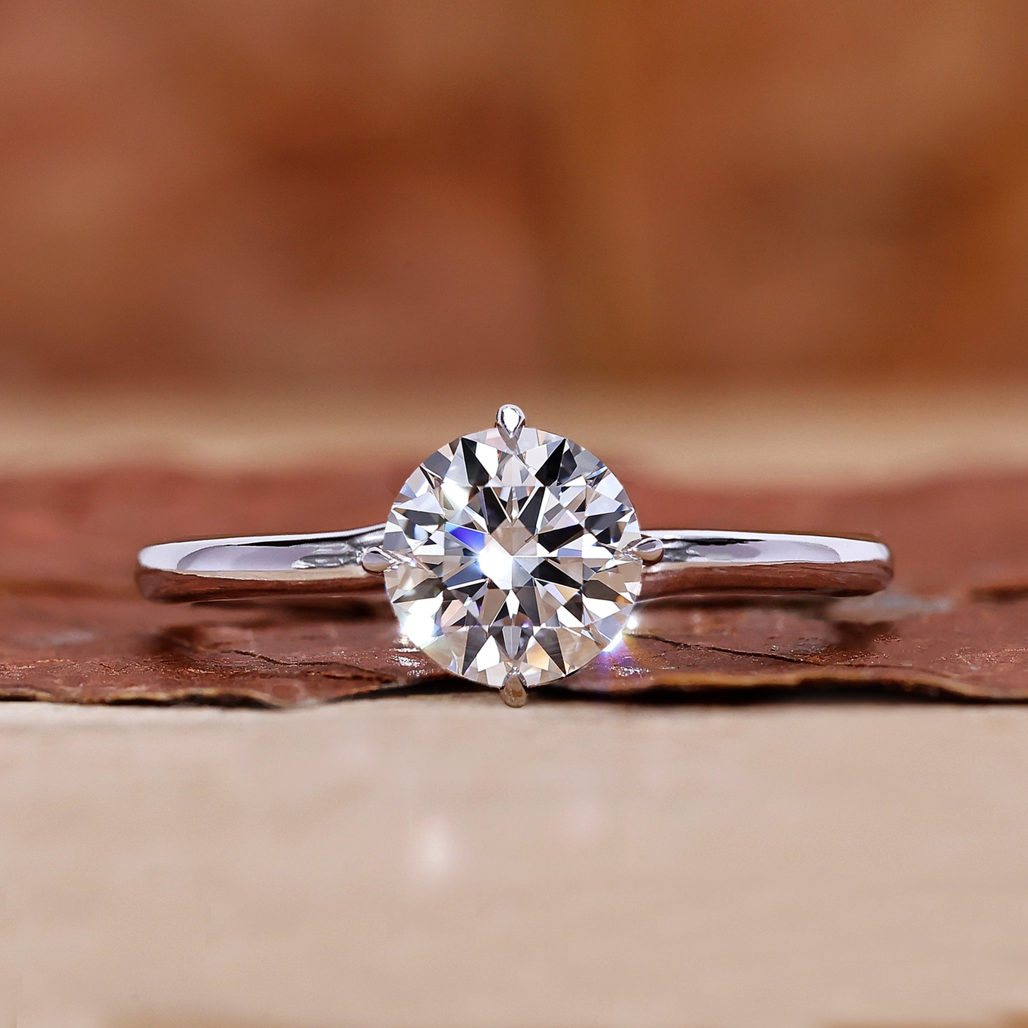 Solitaire engagement ring with round diamond engagement ring.