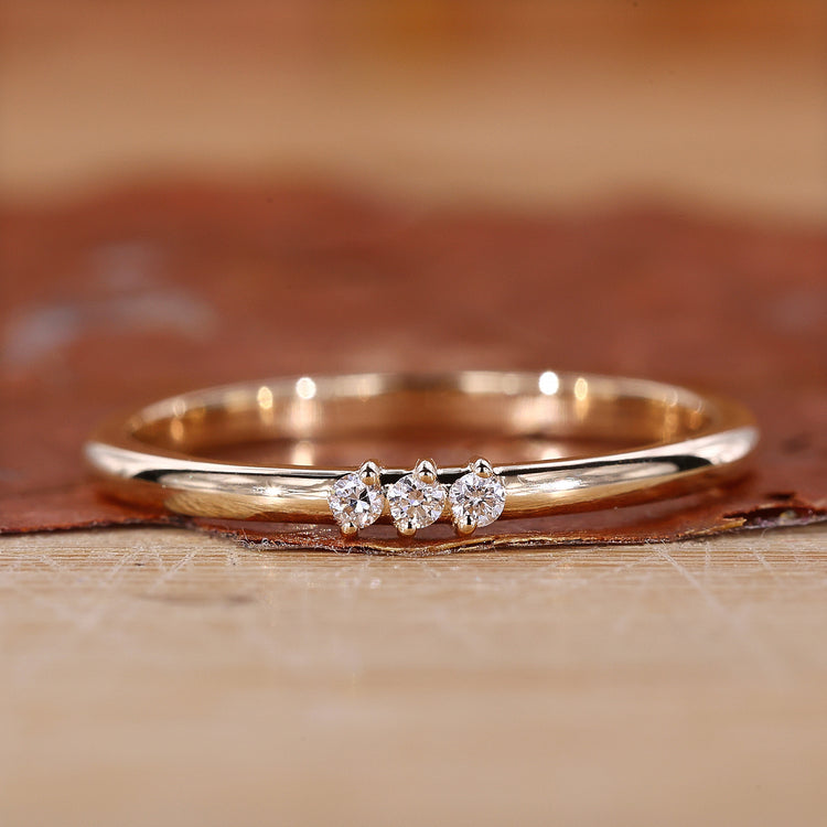 Round cut diamond wedding band.