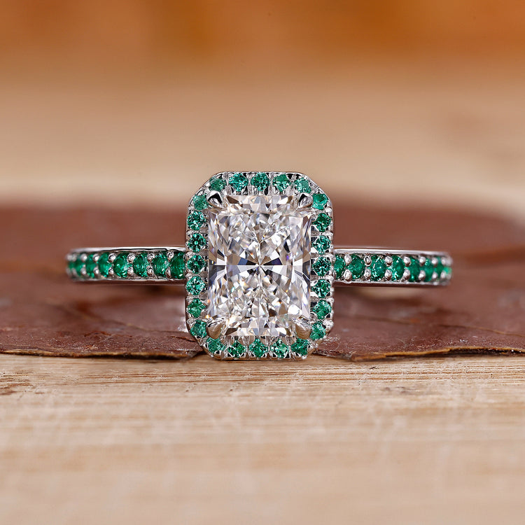 Radiant engagement ring with a halo pavé setting.