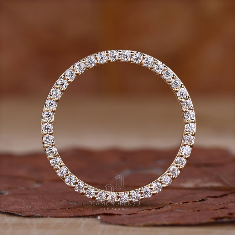 Lab grown diamond eternity band in gold.