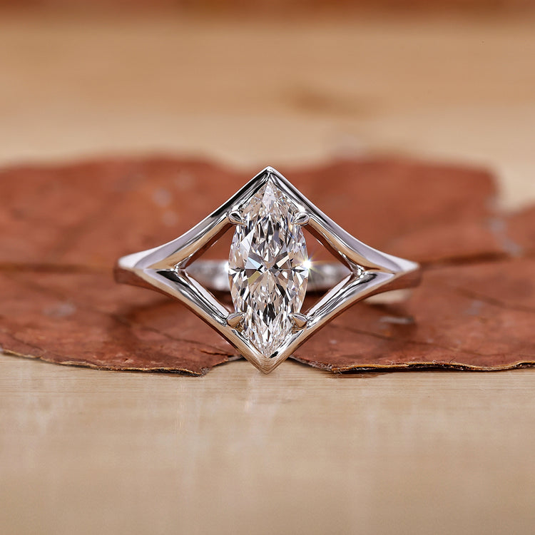 Marquise engagement ring with solitaire diamond engagement ring.