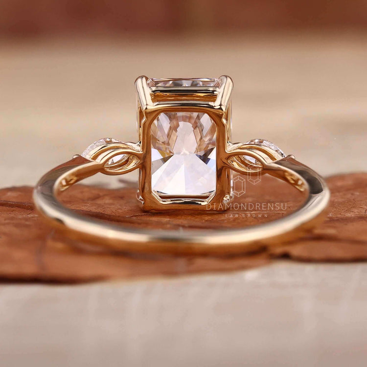 Marquise engagement ring in yellow gold, featuring Lab Grown Diamonds and a bespoke handmade jewellery design.