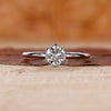 Solitaire engagement ring with nature inspired ring design.