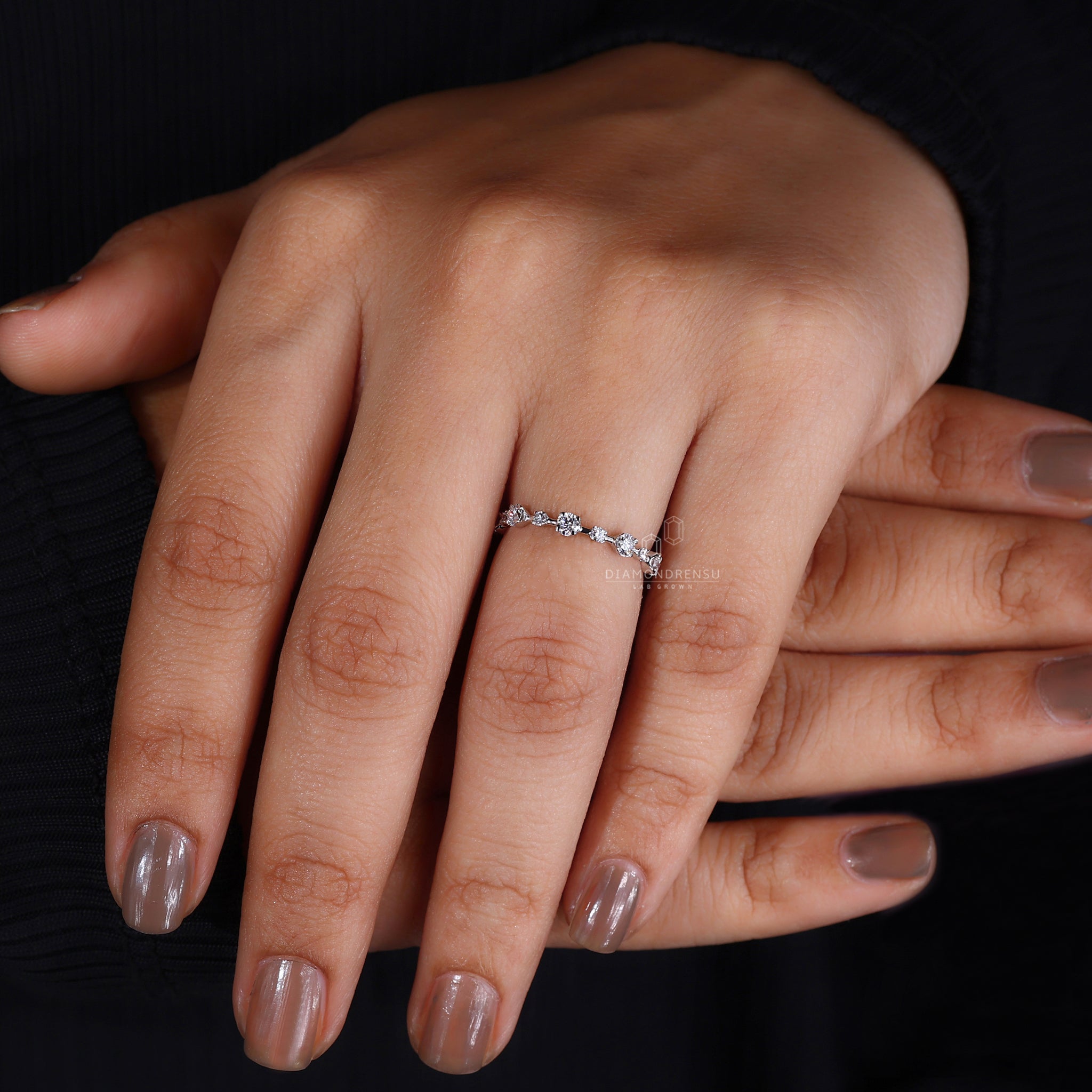 White gold diamond wedding band with distance pave setting