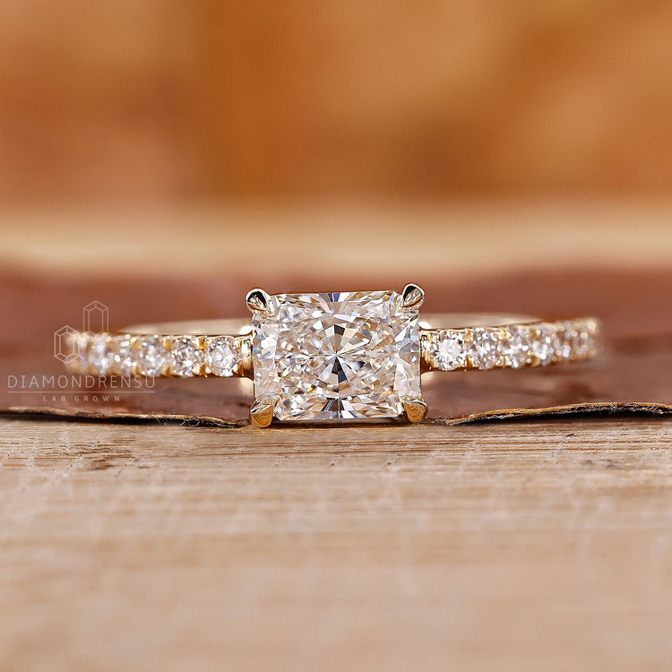 Diamondrensu UK engagement ring with lab diamond and four claw prong set.