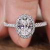 Oval shaped engagement ring with a classic and elegant design.