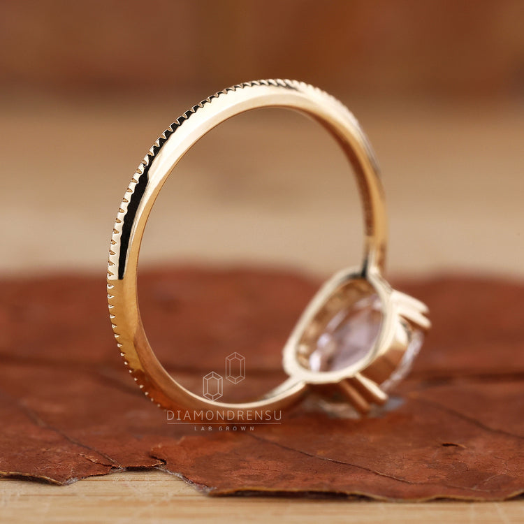 UK engagement ring with round rose cut diamond and hidden heart setting.