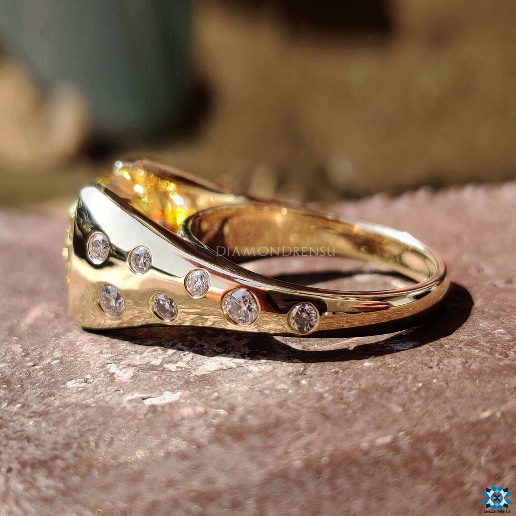 Cathedral setting ring with vibrant yellow cushion cut moissanite.