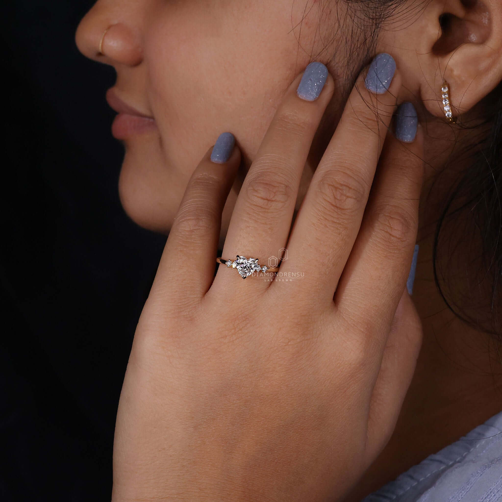 Heart diamond shape ring featuring a unique V prong setting, perfect for engagements.