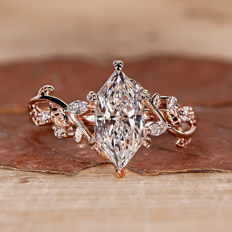 Nature Inspired Engagement Ring with a Dutch Marquise Cut Diamond.