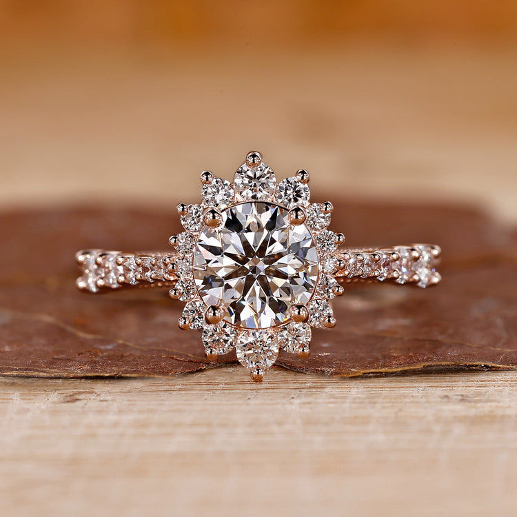 Round diamond ring with a classic halo design.