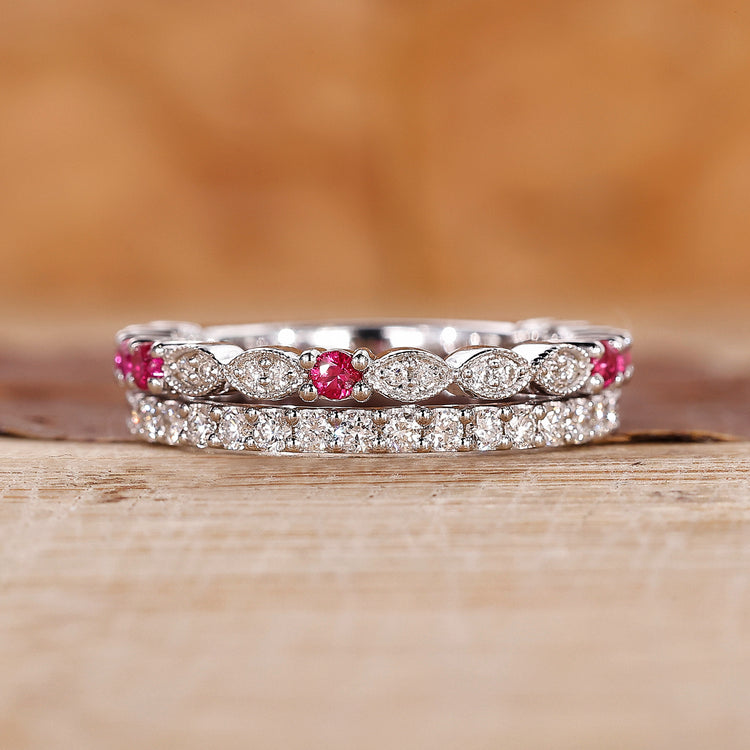 Ruby and diamond wedding band crafted with a double row pave design.