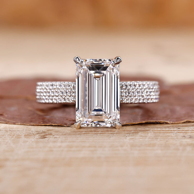 V shaped ring with marquise diamond and hidden halo design.