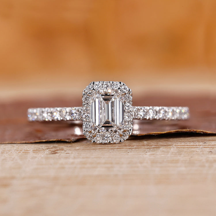 Emerald Engagement Ring paired with round engagement ring.