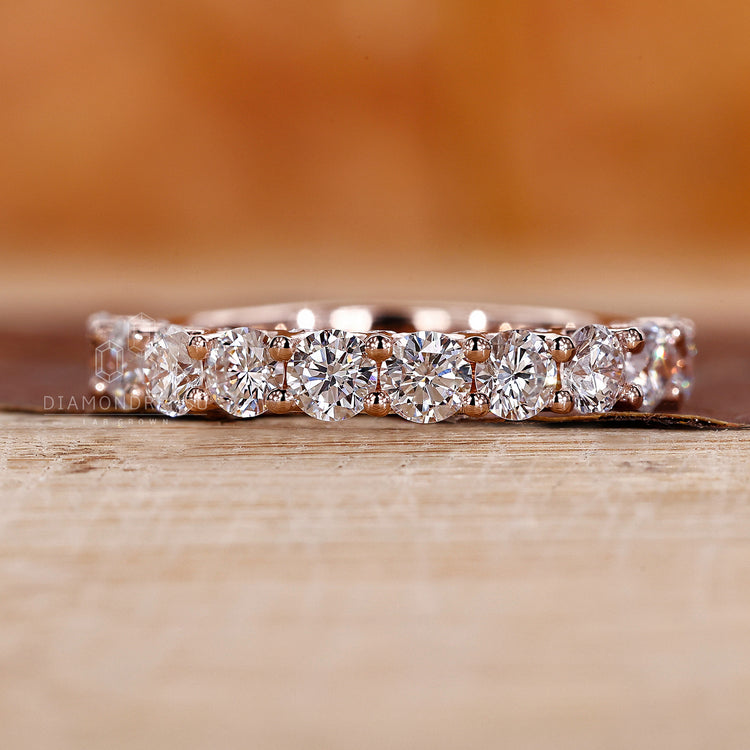 Half eternity wedding band with round diamond