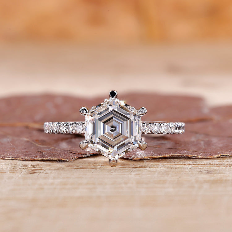 Hexagon engagement ring with hidden halo and pave setting.