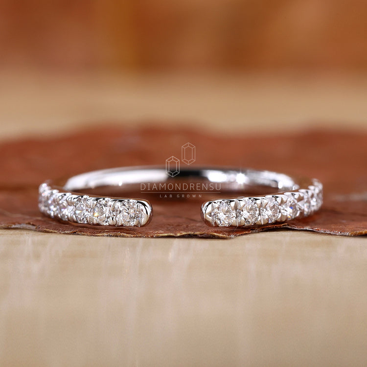 Lab diamond semi eternity band in white gold.