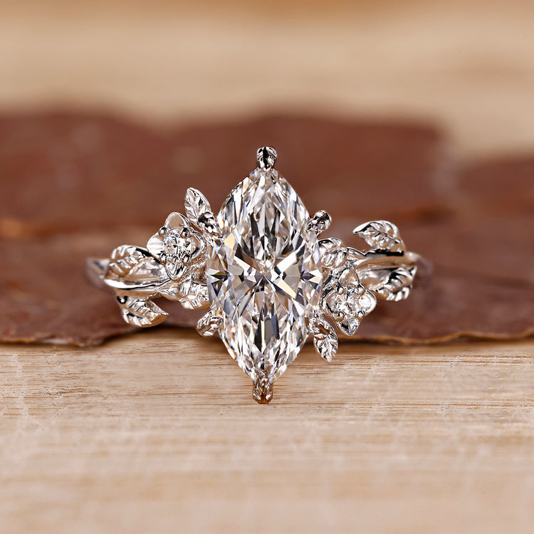 Nature inspired diamond ring with marquise center.