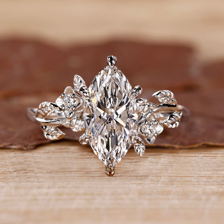 Nature inspired diamond ring with marquise center.