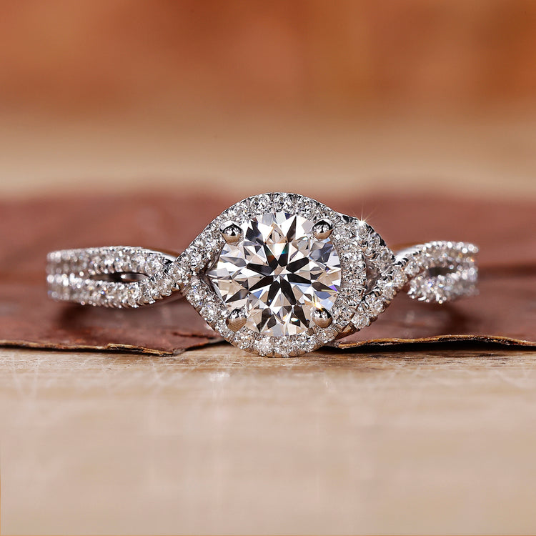 Halo Diamond Engagement Ring with sparkling round cut stones.