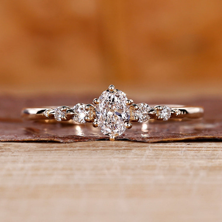 Gold oval diamond engagement ring
