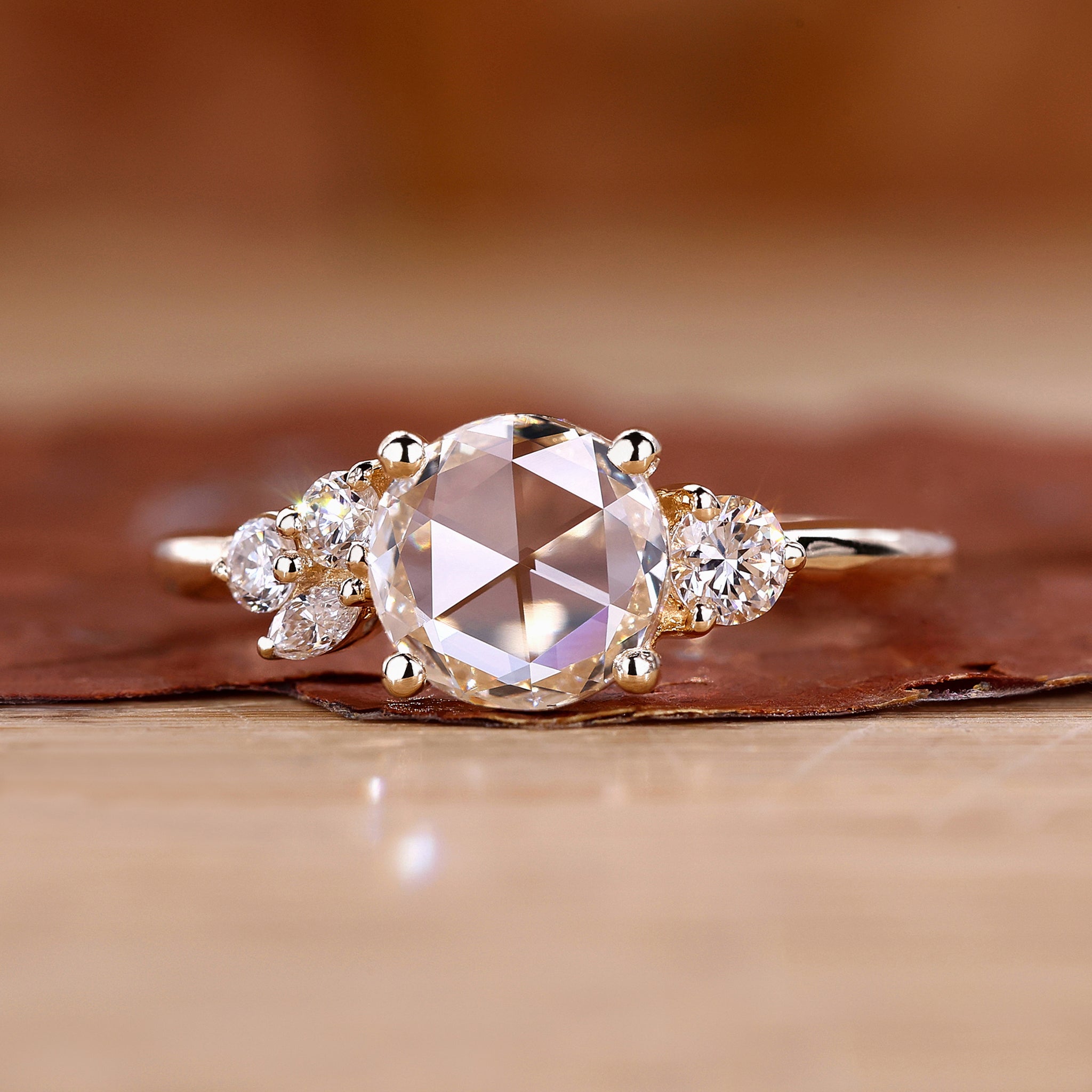 Rose Cut Diamond ring is made using yellow gold ring.