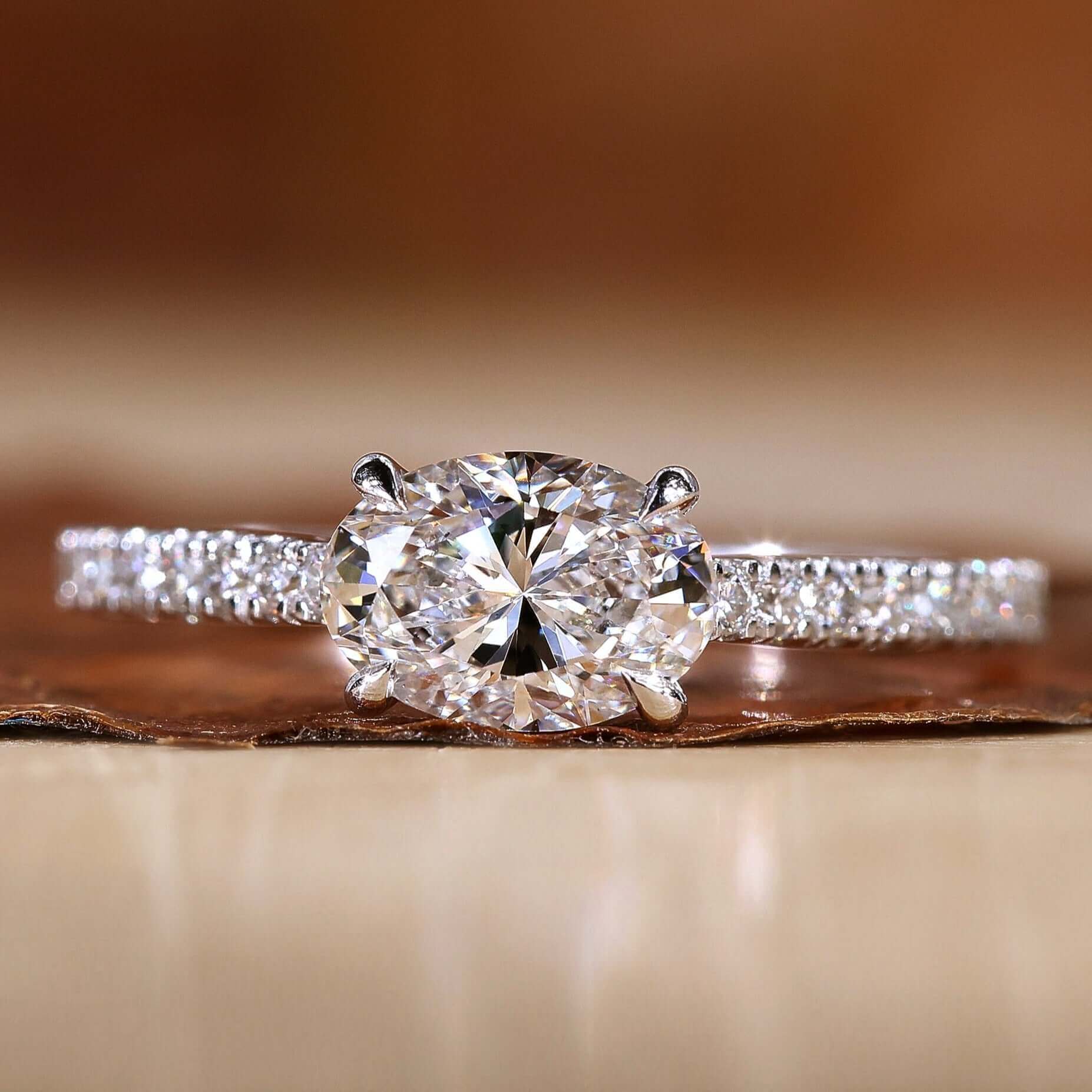 Oval diamond engagement ring with a classic cathedral setting