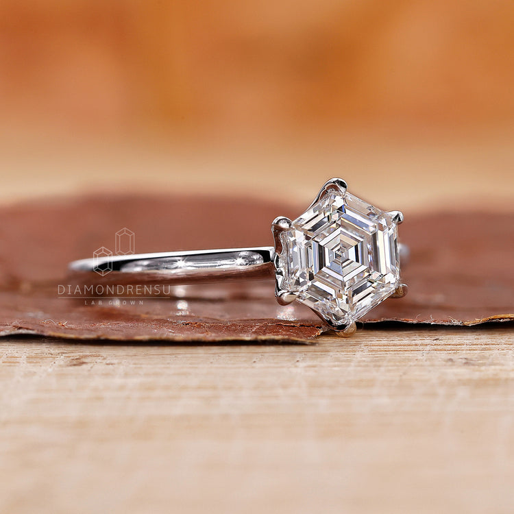 Handmade solitaire ring with 6 prong claw setting.