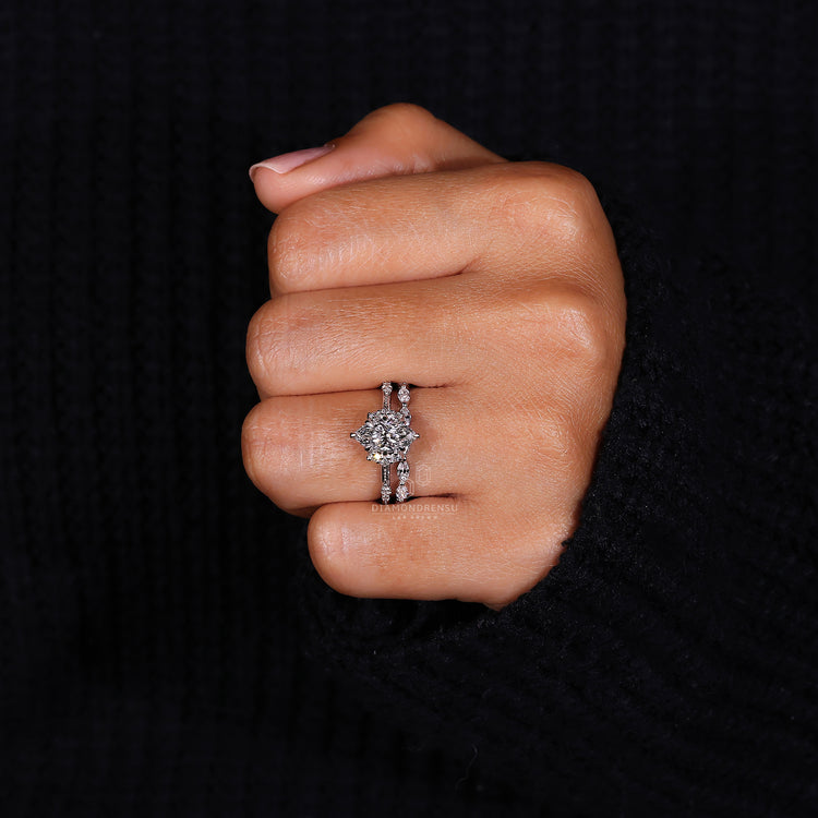 Claw prong marquise cut ring designed with shared prong band.