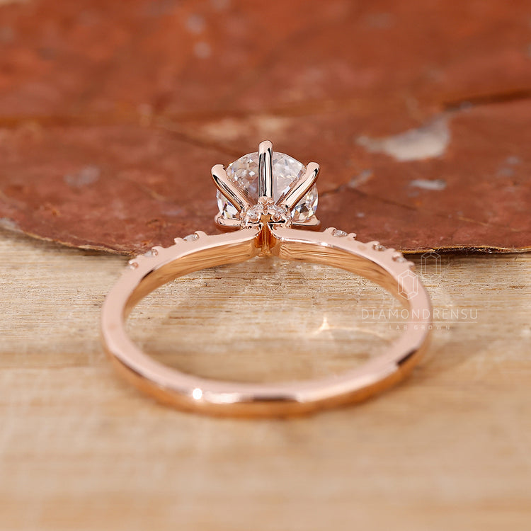 Lab Grown Diamond pave setting ring with a 6 prong jubilee cut diamond.