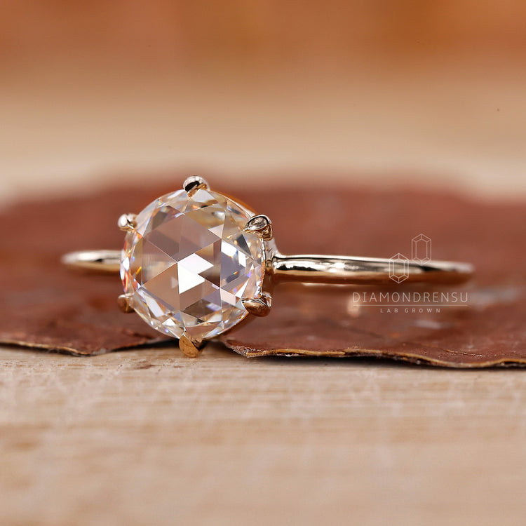 Handmade yellow gold ring with IGI certified diamond.
