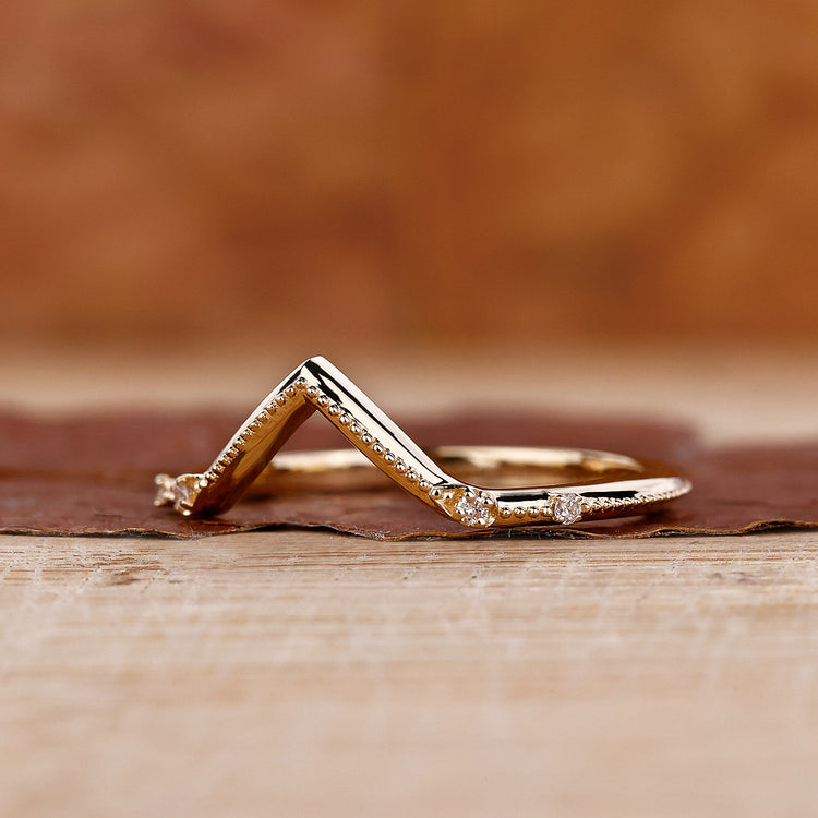 Milgrain band with lab grown diamonds.