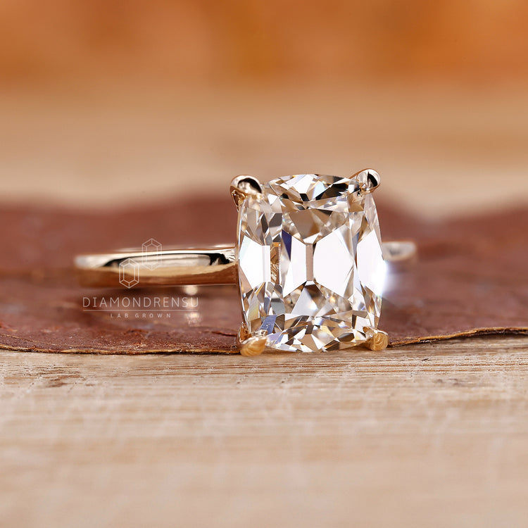 Engage Ring UK highlights solitaire style with prong and cathedral mix.