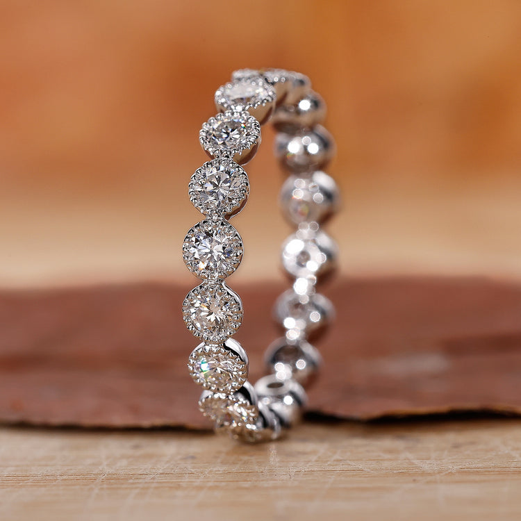 White gold bezel diamond eternity ring.