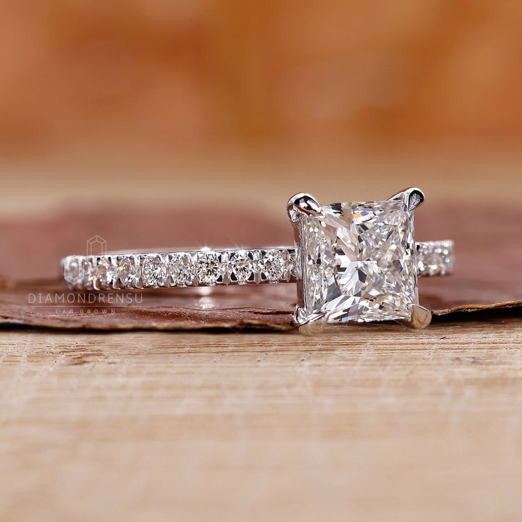 4 prong claw setting ring with princess cut diamond.
