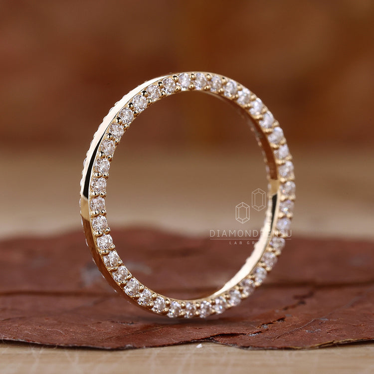 Handmade yellow gold diamond wedding band.