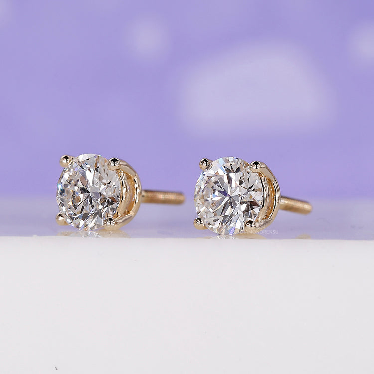 Diamond stud earrings UK made with gold and lab grown stones.