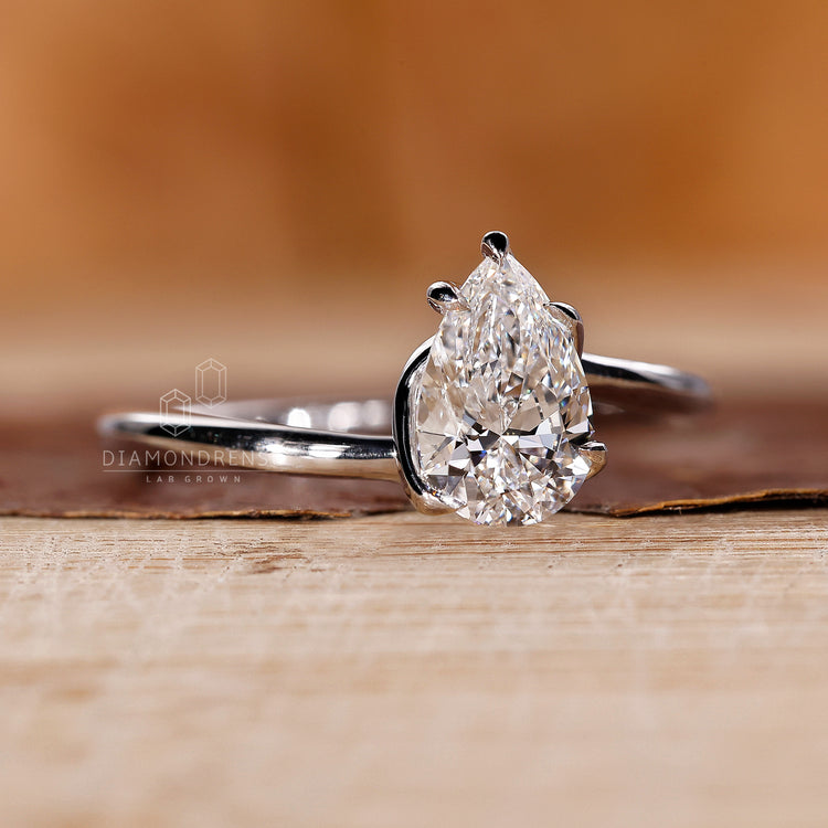 Solitaire diamond ring with IGI certified pear shaped stone.