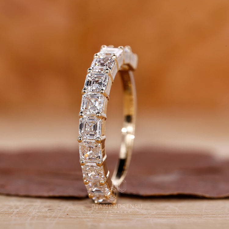 Diamondrensu UK Asscher cut wedding band.