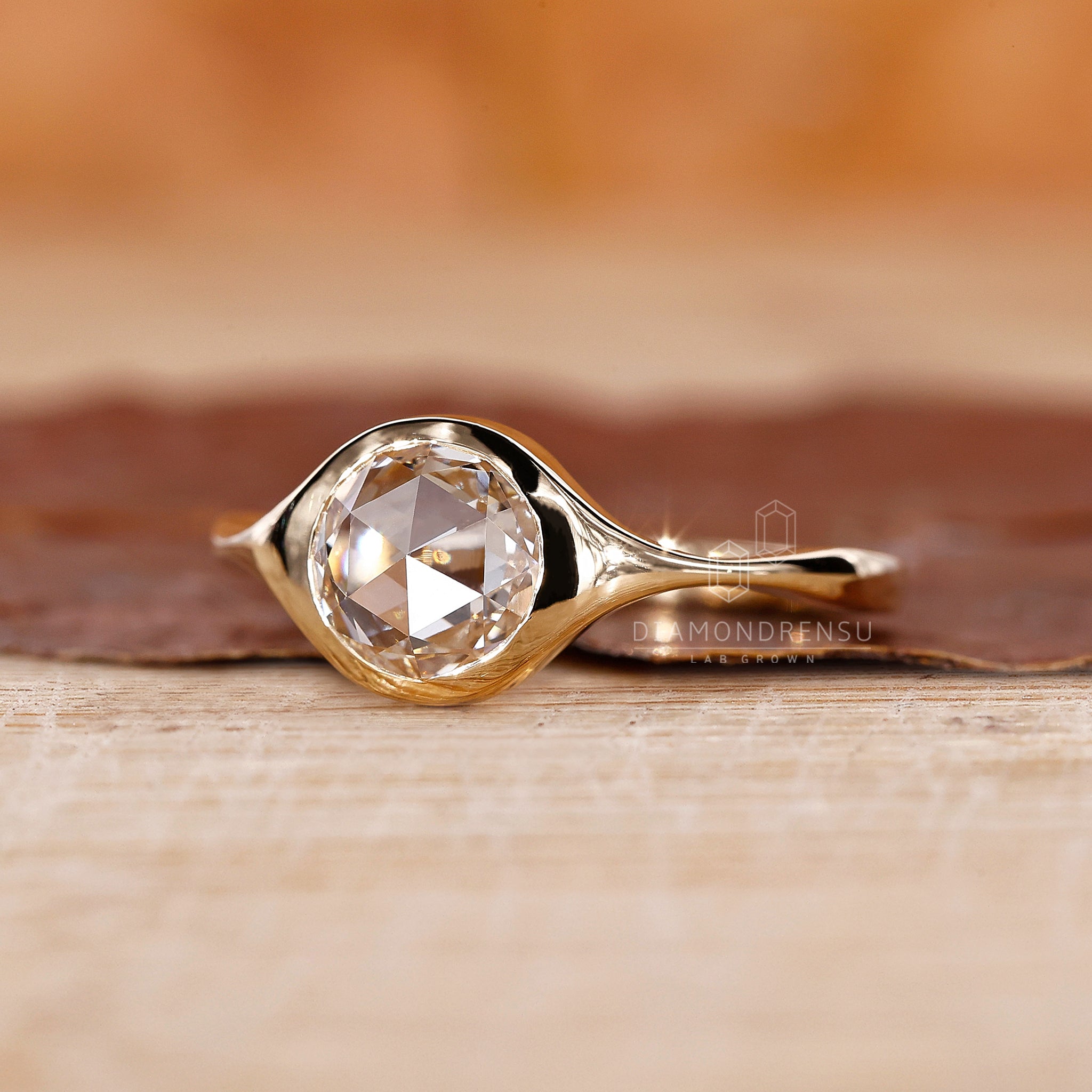 Handmade ring by Diamondrensu UK in bezel setting style.