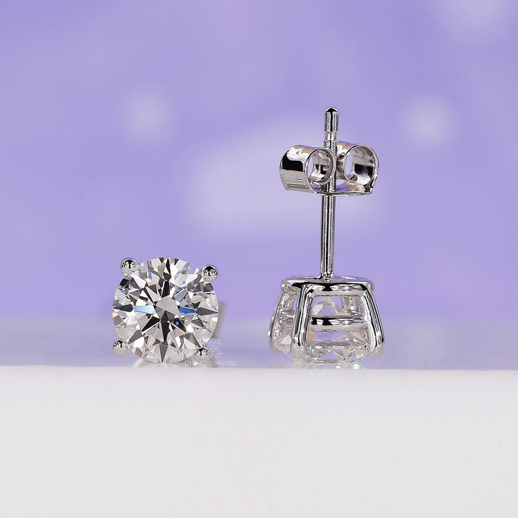 Diamondrensu UK earrings showcasing round studs in handmade gold style.