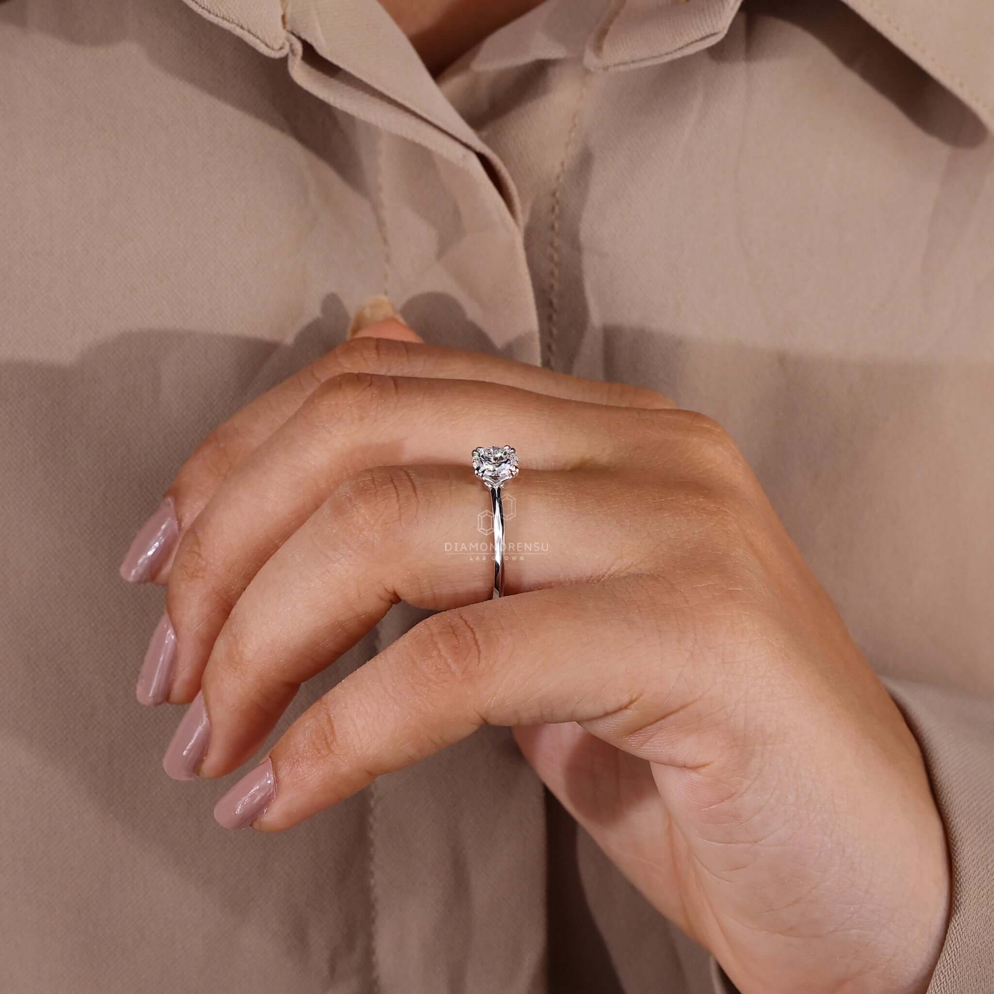 Double prong engagement ring with a 4 prong diamond ring style in a diamondrensu UK ring design.