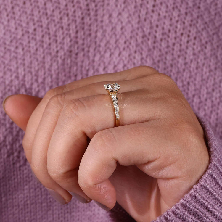 Engagement ring for women featuring a round cut diamond ring and a pave band, ideal for a diamond ring UK style.