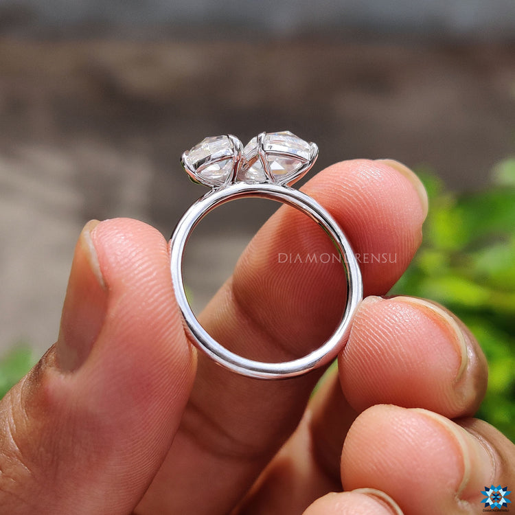 Unique Toi et Moi design with white gold and rose cut stones.
