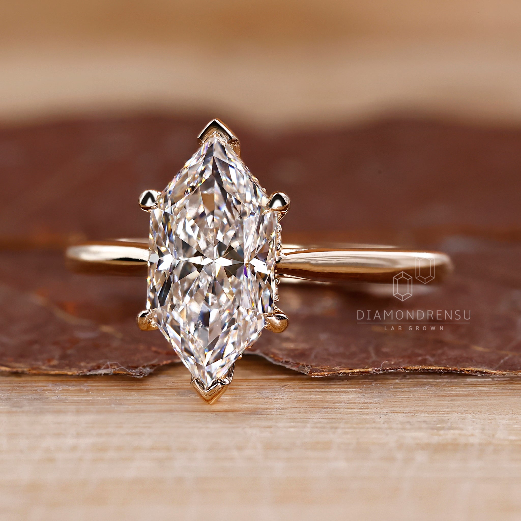 Tapered shank ring with a graceful profile.