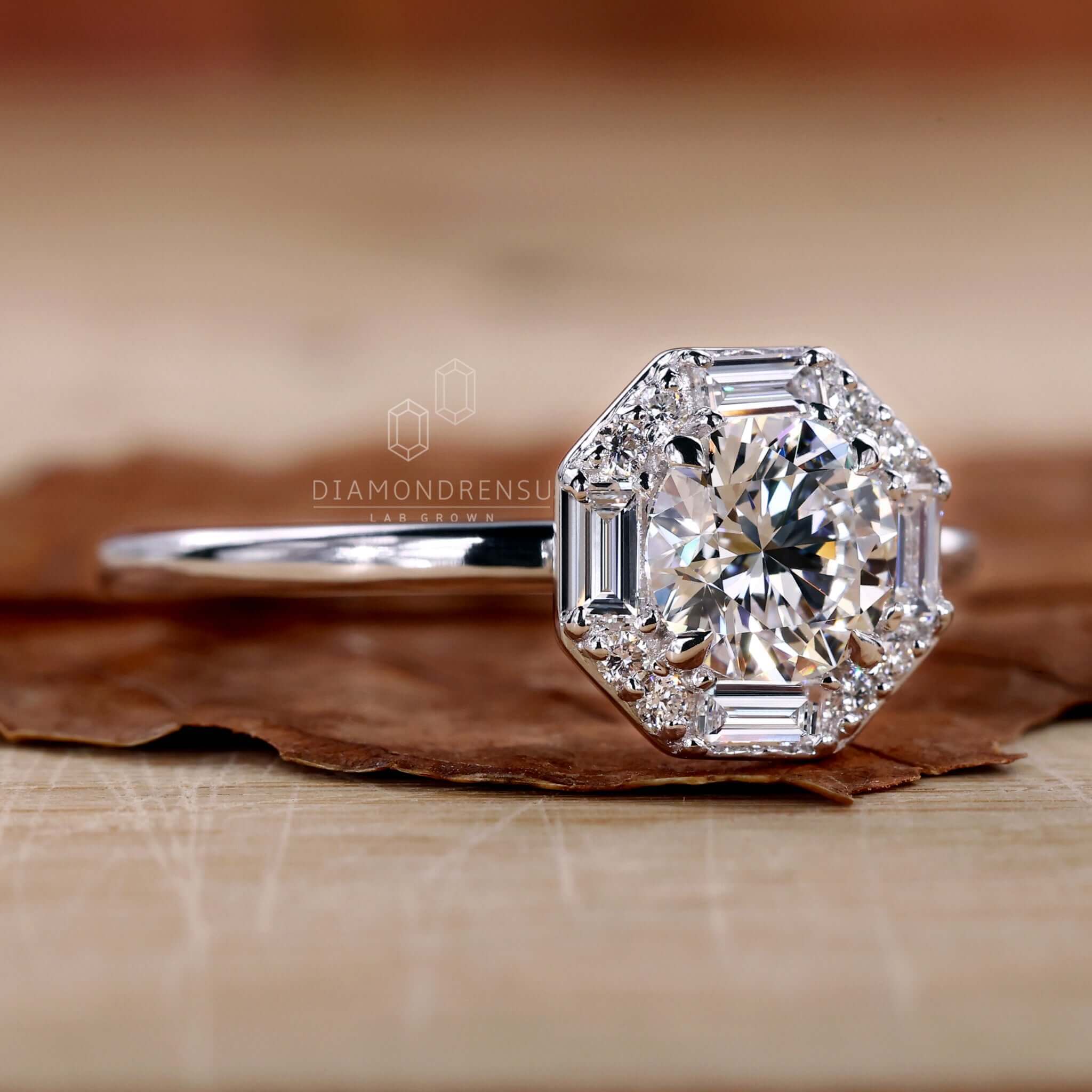 Round ring diamond crafted with a 4 prong claw setting and pave details, ideal for a UK engagement ring.