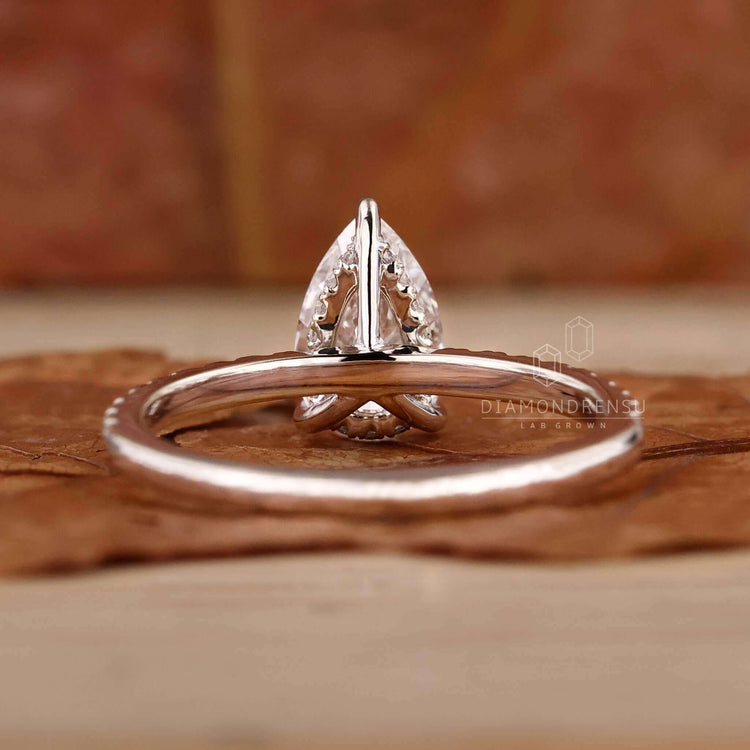 Modern pear cut engagement ring with a flawless finish.