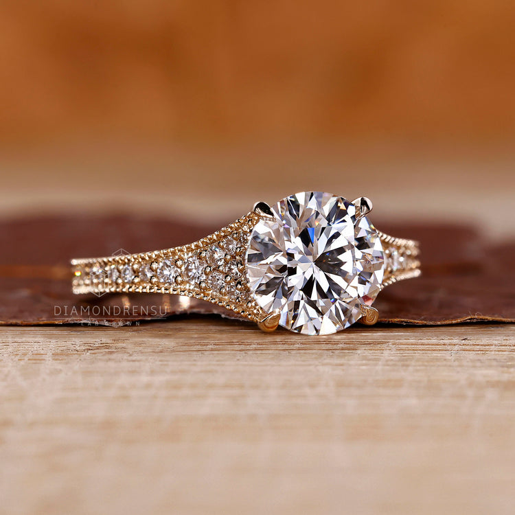 4 claw prong setting ring holding a clear diamond.